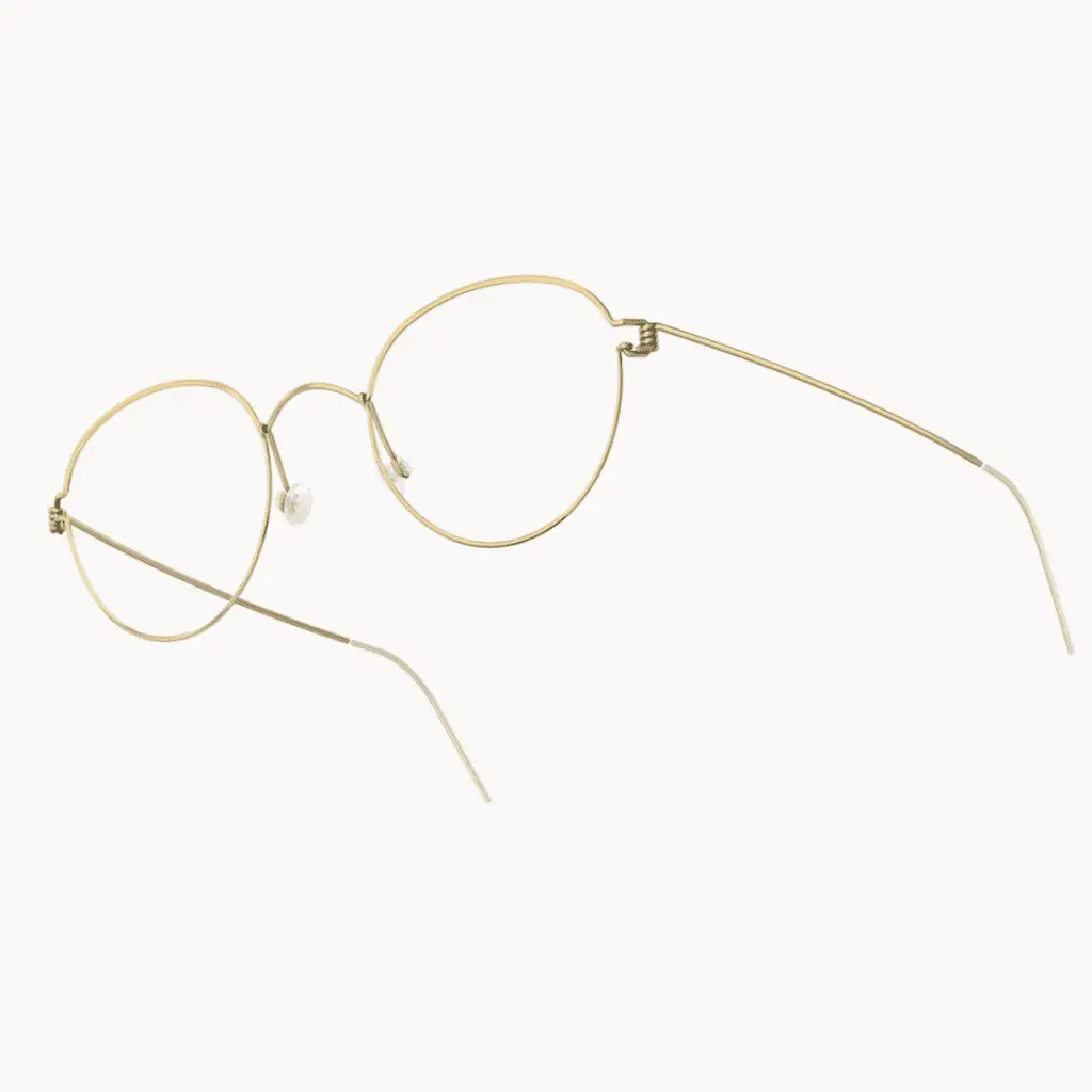 Runde goldene Brille von Lindberg auf weißem Hintergrund